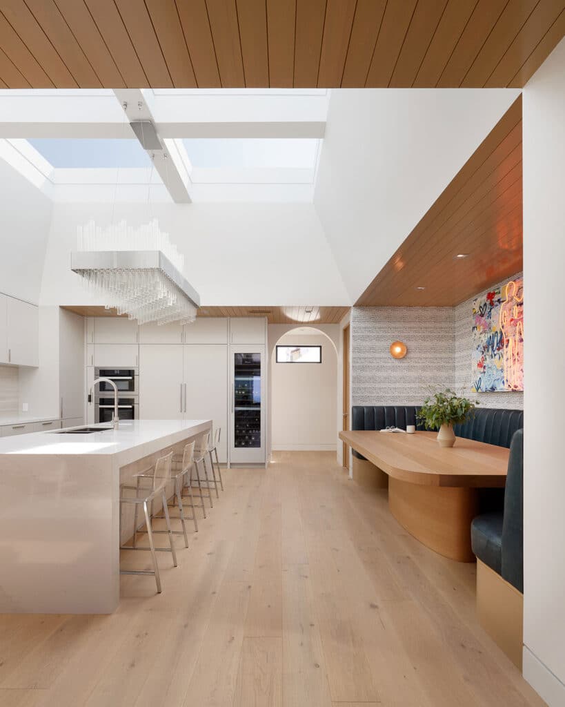 Kitchen with dining area in beautiful beach home built by RJ Smith Construction