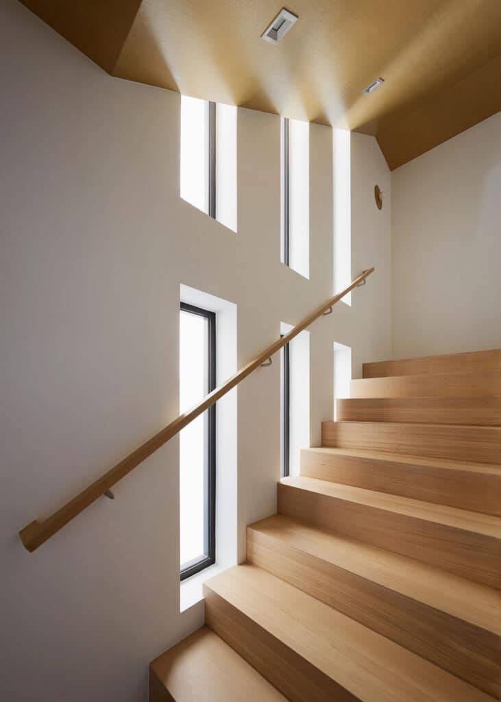 staircase in modern beach home built by RJ Smith Construction