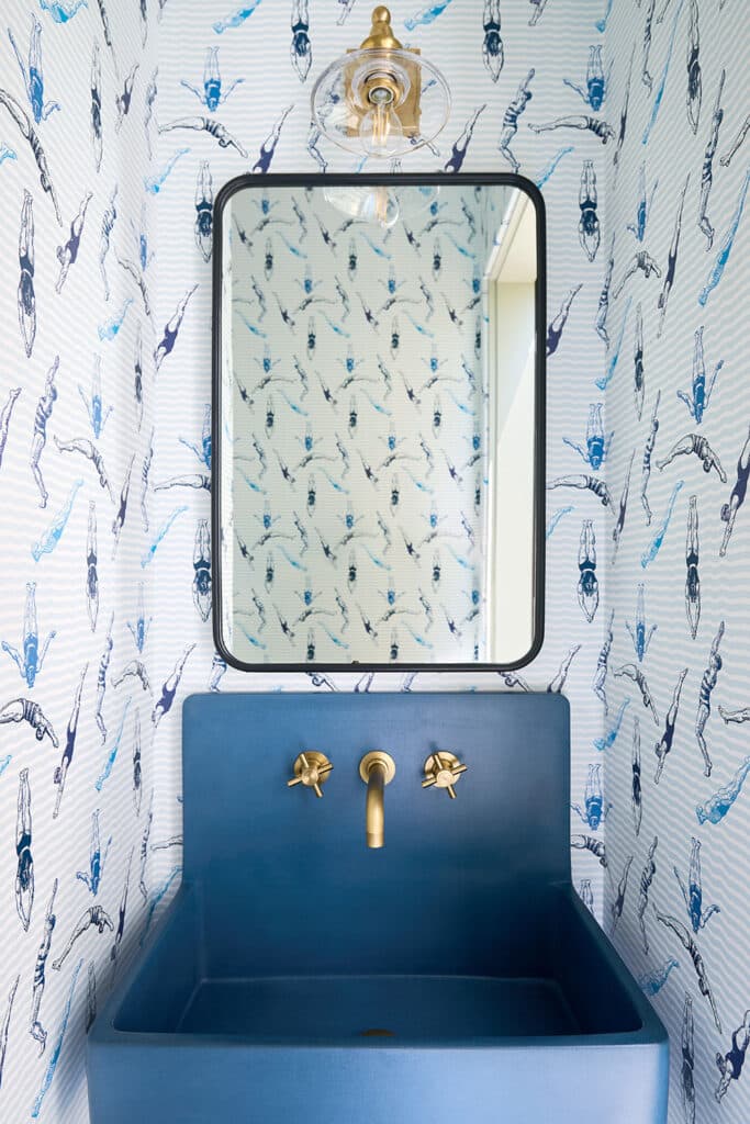 Wash area with Diving wallpaper in home built by RJ Smith Construction